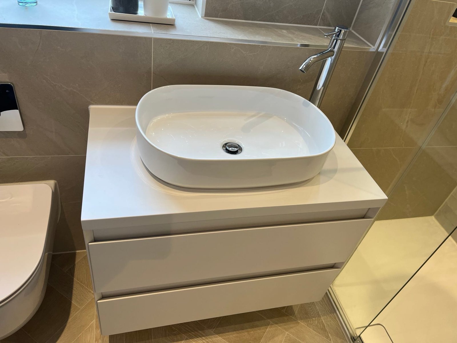 Modern bathroom sink installation by a trusted local plumber in Walton-on-Thames